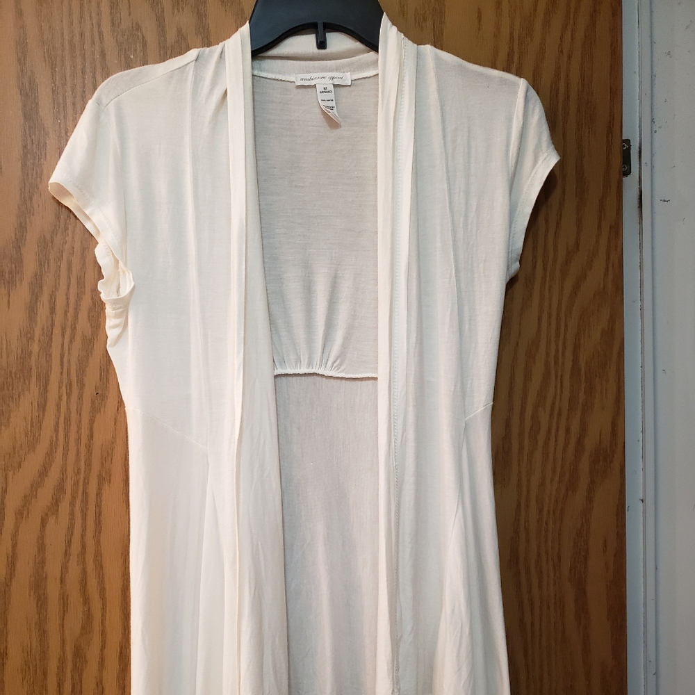 Beautiful white, short sleeve blazer/kimono. Longer in front and gathered back.